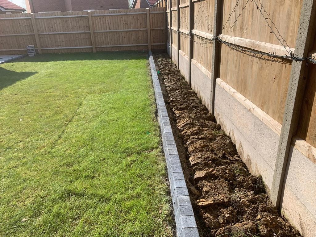 soft landscaping and block paved edges