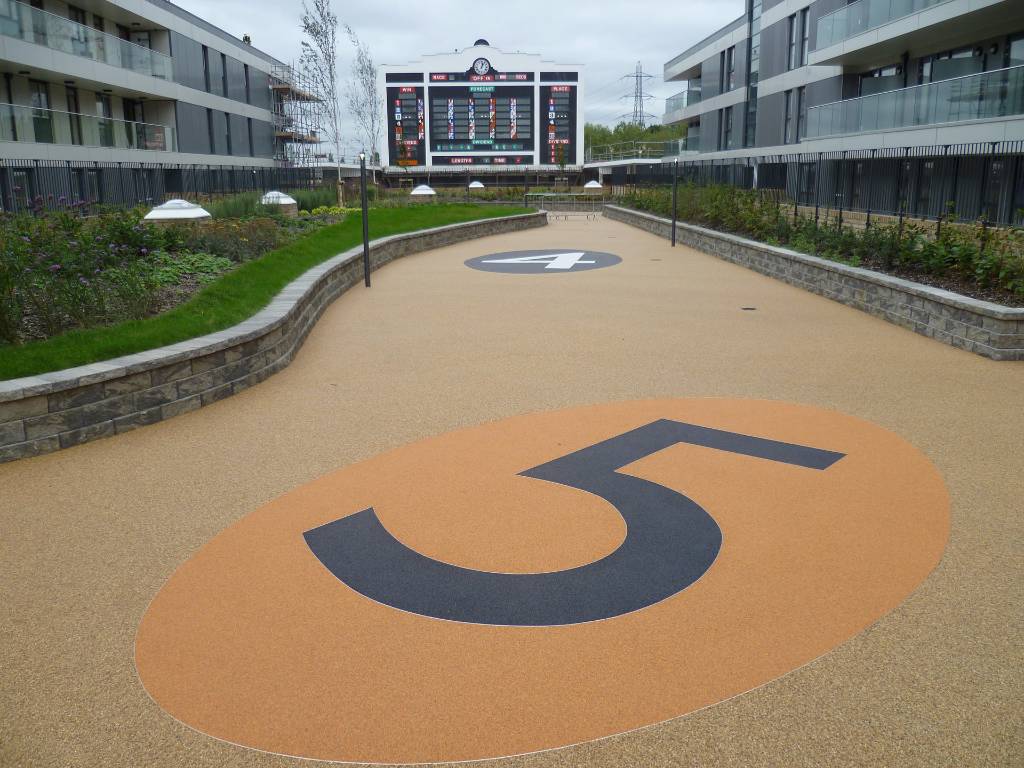 Resin bound gravel installation with the number 5 in black