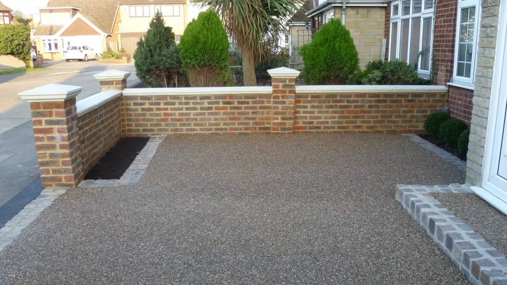 Terrabase Rustic Oak Porphyry Setts Laid Around Driveway in Sevenoaks, Kent installed by Greenstone Landscapes