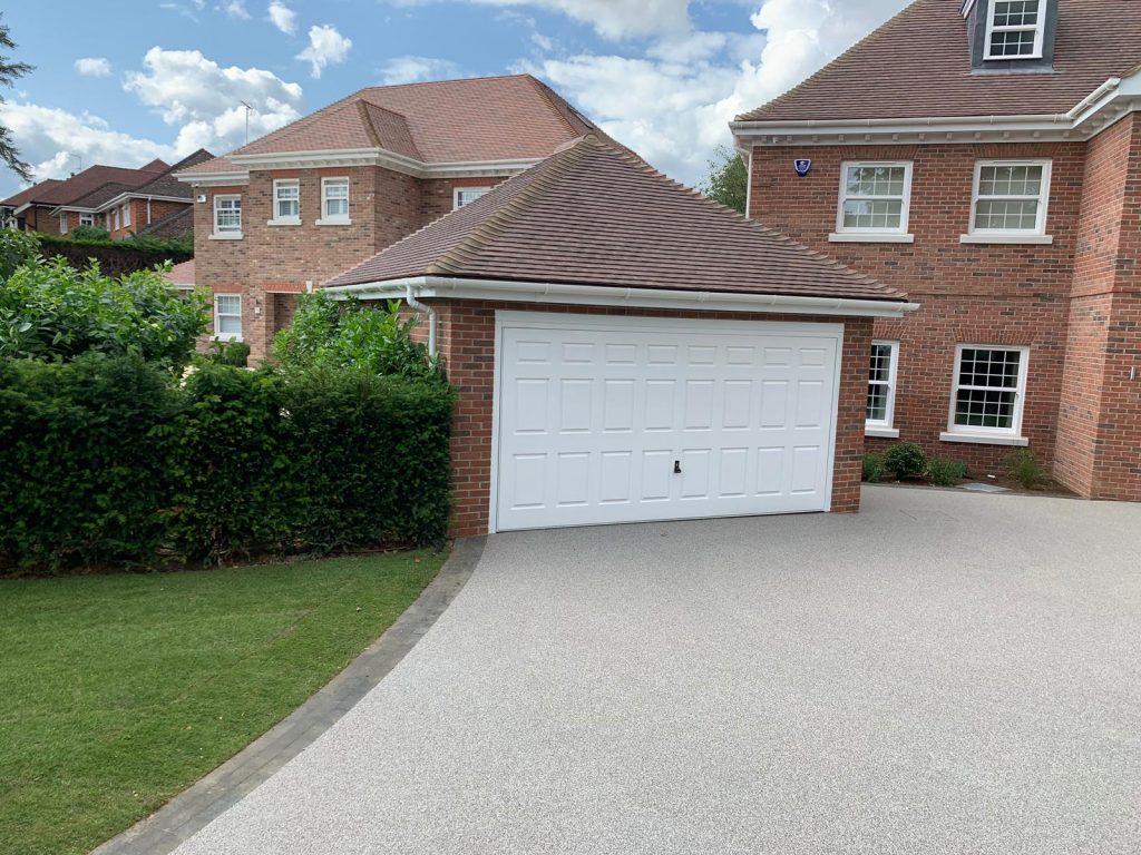 sweeping silver resin bound driveway